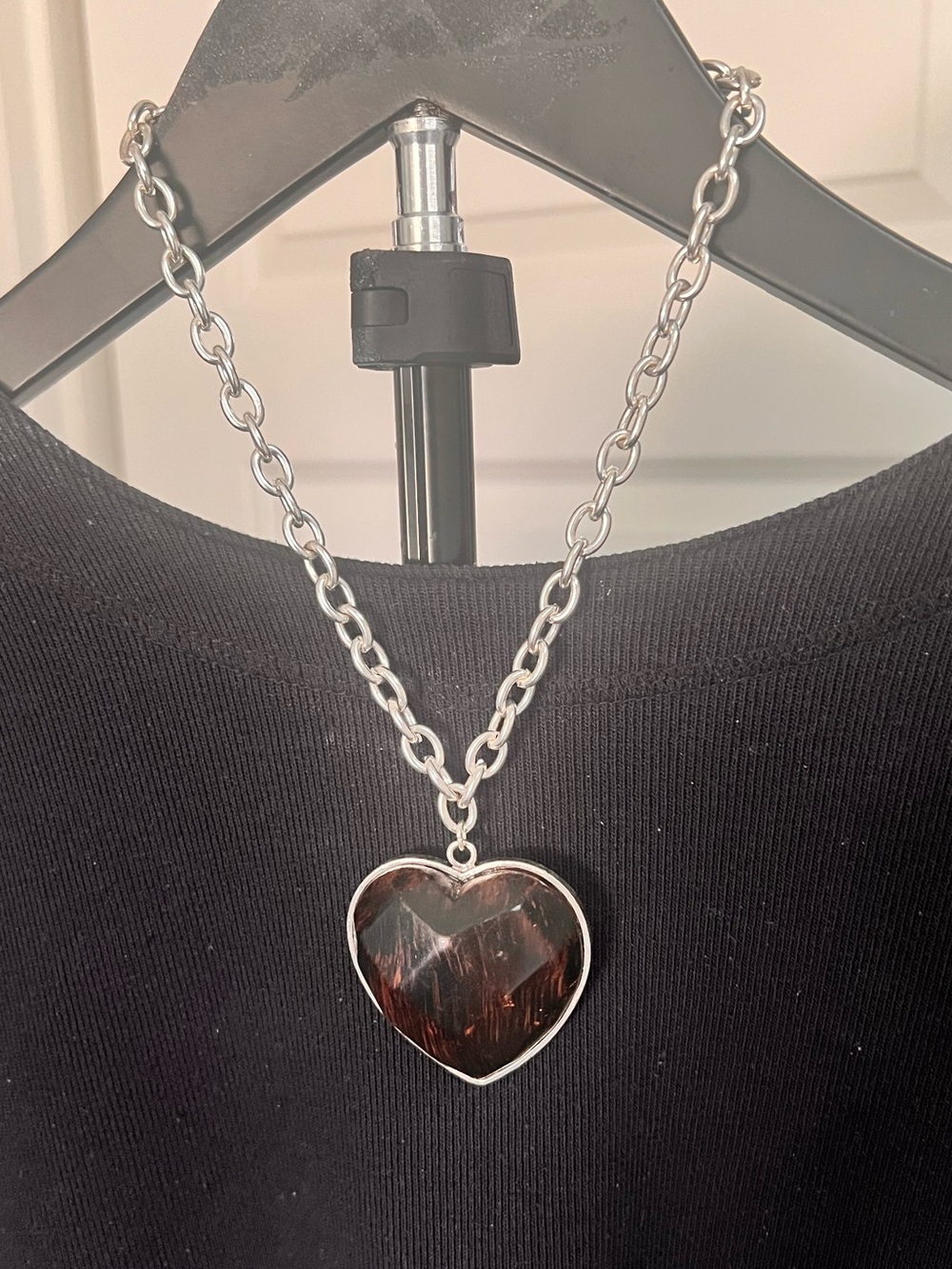 Big Brown Heart stone on a silver tone chain.